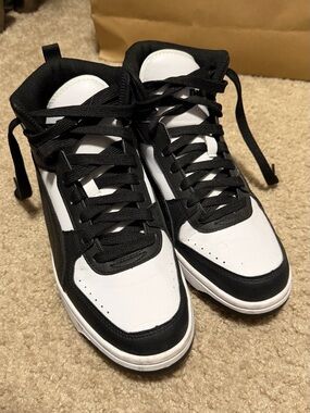 Black and White Puma High-Top Sneakers